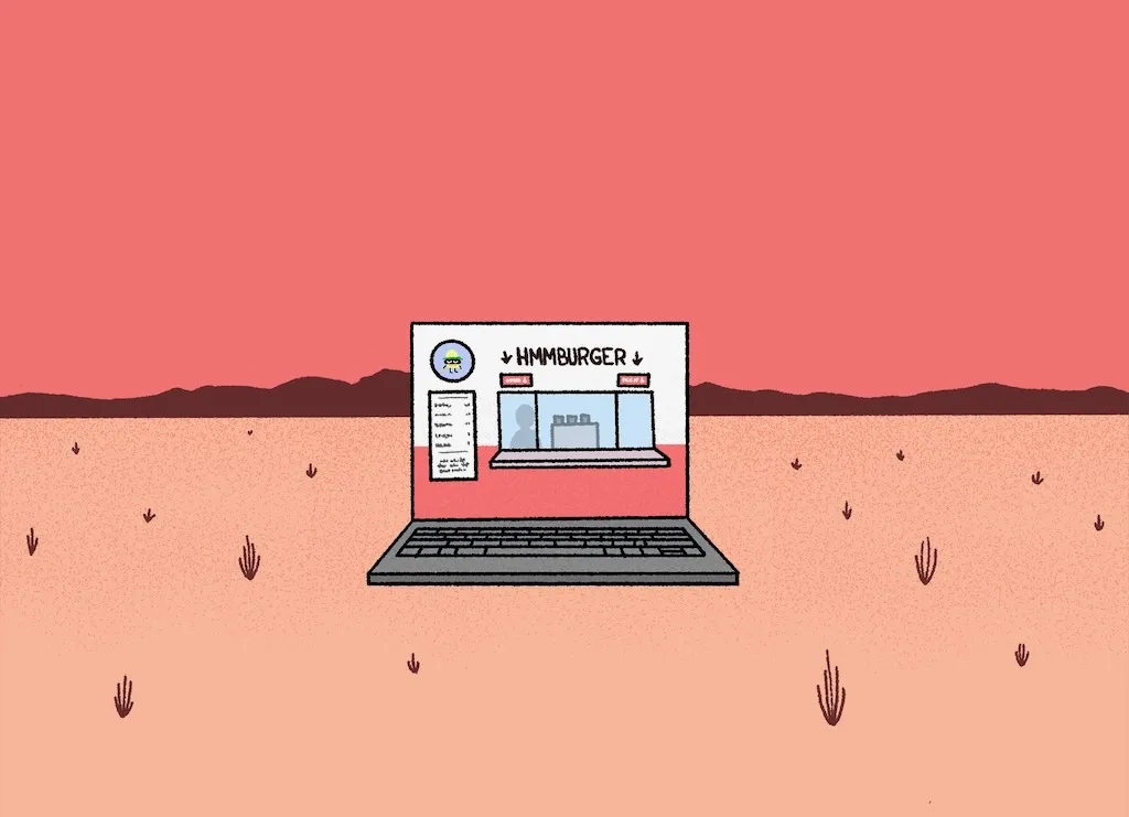 A mountain range with some flora surrounding the Hmmburger laptop.